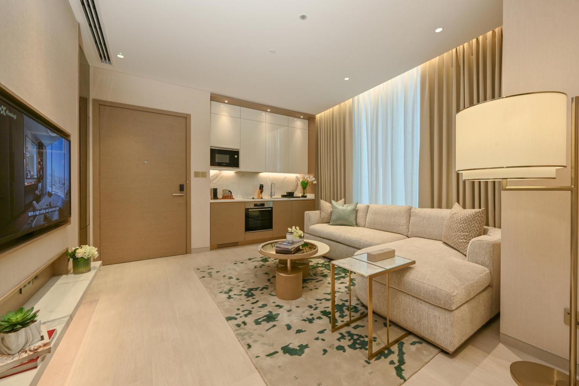 Onyx Rotana Hotel มานามา ภายนอก รูปภาพ A living room at the Ritz-Carlton, DIFC